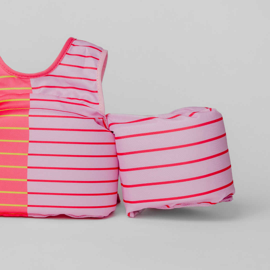 Close-up of Pink Lemonade Stripe kids swim float with pink striped arm wing